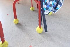 Tennis balls on chair legs